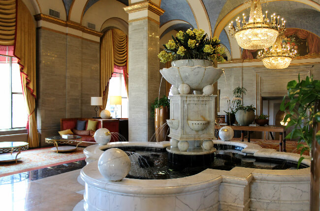 Elegance and comfort in marble and gold gilding.