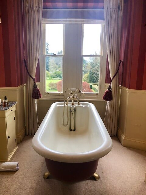 victorian roll top bath tub, gliffaes country house hotel room, crickhowell hotel room south wales