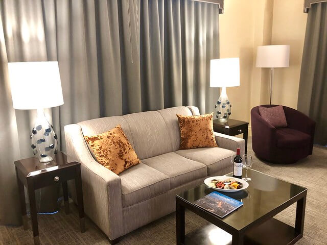 shattuck bay suite with sleeper sofa and coffee table