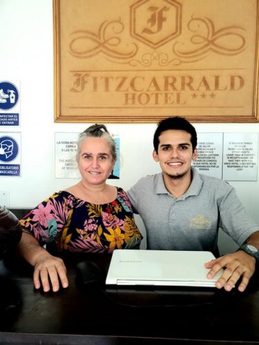 Owners of the Fitzcaraldo Hotel at Reception Desk