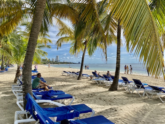 At all-inclusive Coral Caribe Beach Resort there are plenty of lounge chairs on the beach.