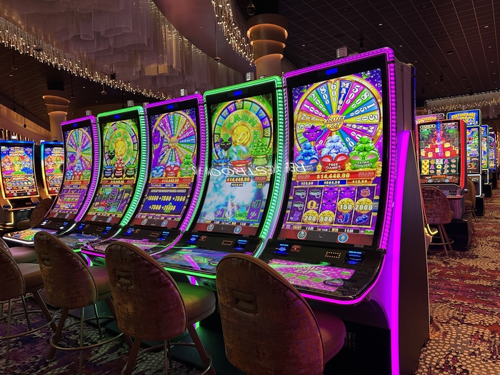 Several slot machines in a casino.