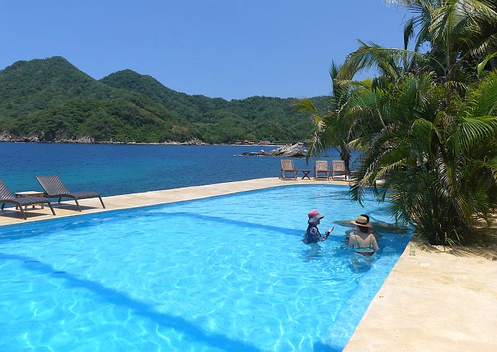 swimming pool with a view of the mountains
